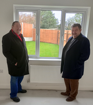 Cllrs Rhind and Mulgre inside newbunglow, Newhall, Dec 2023