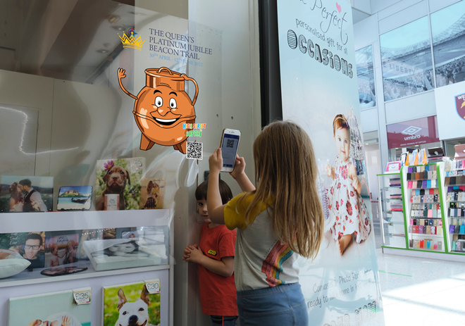 Girl Scanning Beacon