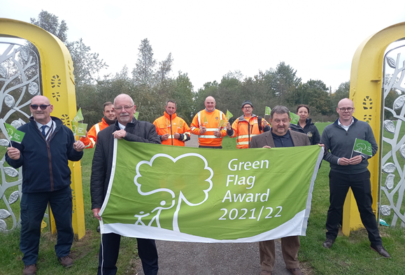 Cllrs and staff celebrating Green Flag award