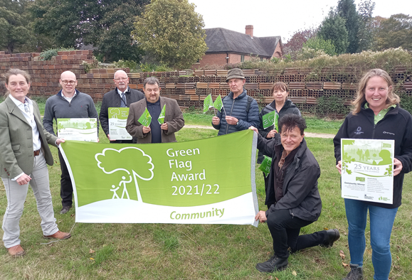 Cllrs ,staff and volunteers celebrating award