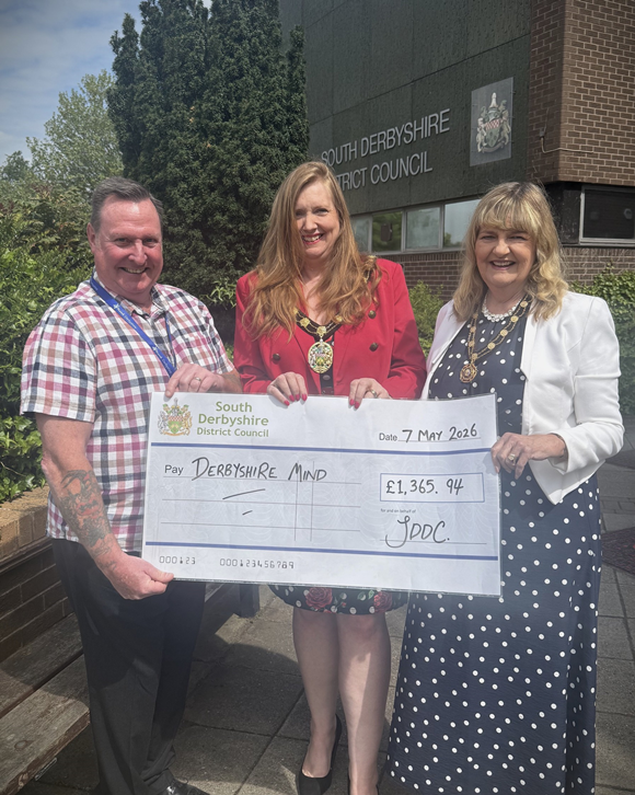 ​​​​​​​South Derbyshire District Council Chair hands over charity fundraising total to Derbyshire Mind