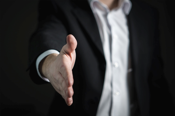 Hand shaking - business news