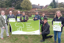 Cllrs ,staff and volunteers celebrating award