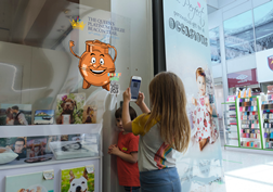 Girl Scanning Beacon