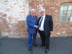 Cllr Michael Stanton receiving the chains